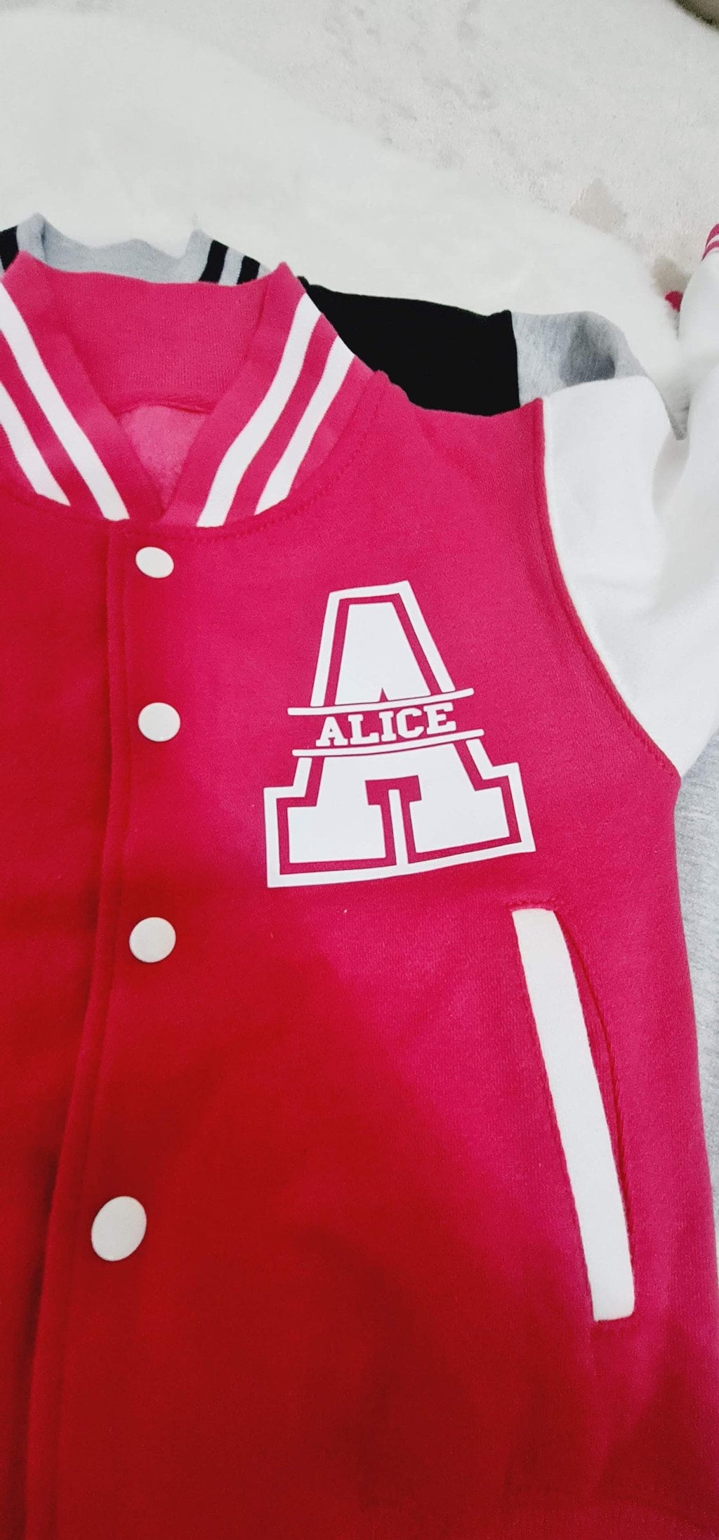 Red jacket with a logo on a white background