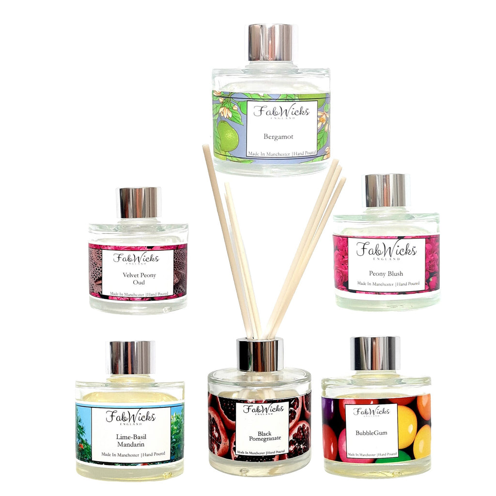 Collection of FabWicks diffusers with various scents on a white background