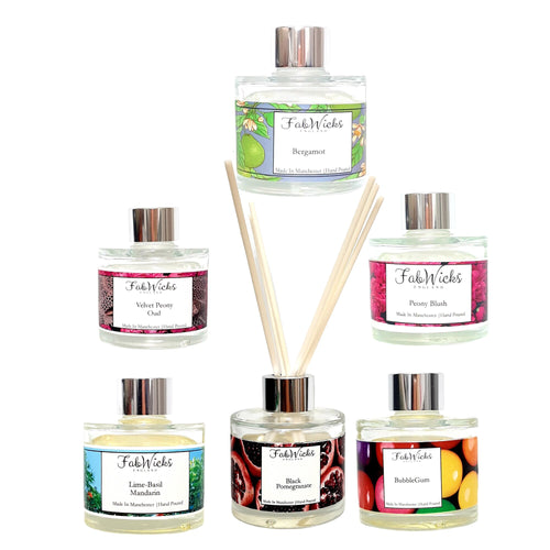 Collection of FabWicks diffusers with various scents on a white background